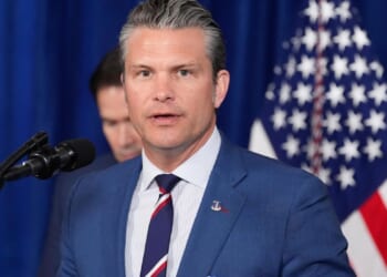 Plane used in boat strike off Venezuela was painted to look like a civilian aircraft, AP sources say