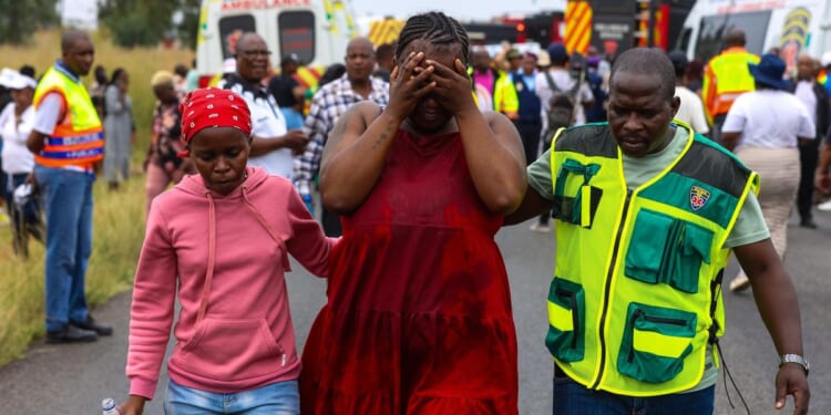 Death toll in South Africa school bus accident rises to 14 as the driver is charged with murder