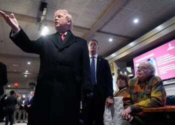 Trump launches midterm campaign blitz in Iowa, hails low gas prices and economic turnaround