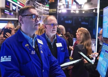 Wall Street drifts around its record-high while the dollar's value stabilizes