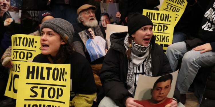 Immigration rights activists stage a sit-in at the Hilton Garden Inn on Jan. 27, 2026, in New York City.