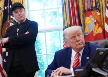 Tesla CEO Elon Musk and President Donald Trump listen to questions from reporters inside the Oval Office of the White House in Washington, DC on May 30, 2025.