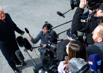 President Donald Trump speaks to the media on the South Lawn of the White House on Friday.