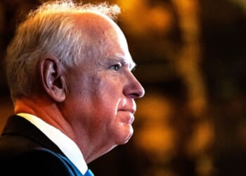 Minnesota Gov. Tim Walz is seen at a Jan. 5 news conference in St. Paul, Minnesota, where he announced that he was abandoning his re-election campaign. Now, Republicans in the state legislature are planning to impeach him.