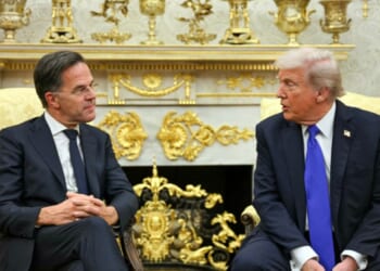 President Donald Trump talks to NATO Secretary General Mark Rutte during their meeting in the Oval Office of the White House in Washington, D.C., on Oct. 22, 2025.
