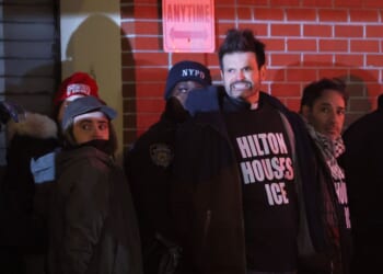 NYPD officers arrest immigration rights activists after a sit-in at the Hilton Garden Inn on Jan. 27, 2026, in New York City.