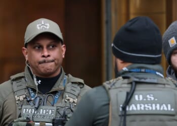 U.S. law enforcement officials stand guard outside of Daniel Patrick Moynihan United States Courthouse on Jan. 5, 2026, in New York City.
