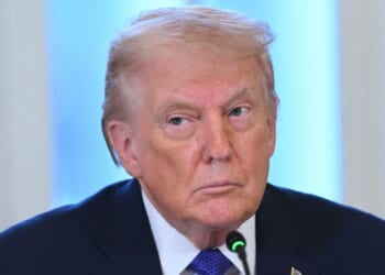 President Donald Trump listens at a meeting with US oil company executives in the East Room of the White House in Washington, DC on Jan. 9, 2026.