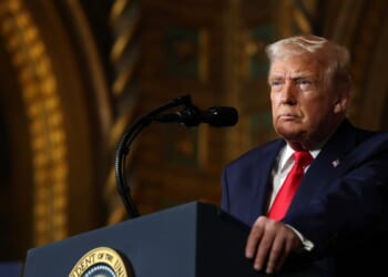 President Donald Trump answers questions at his Mar-a-Lago estate on Dec. 22, 2025.