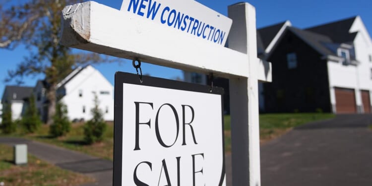 U.S. long-term mortgage rate average barely budges, holding near 6%