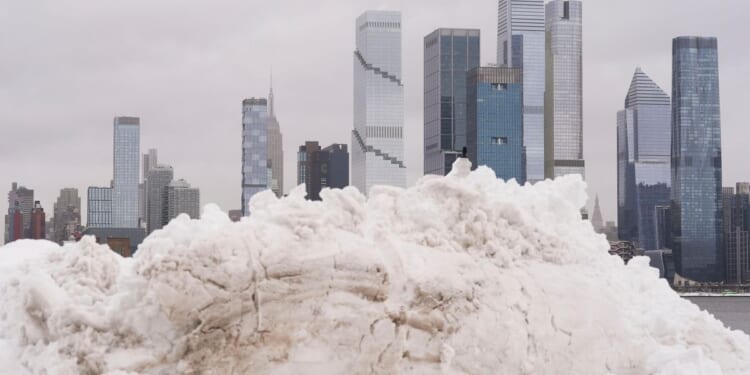 Northeast U.S. digs out from harsh snowstorm that disrupted flights and canceled school