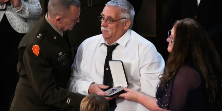 Trump awards Purple Hearts to National Guard members killed, injured in D.C. ambush