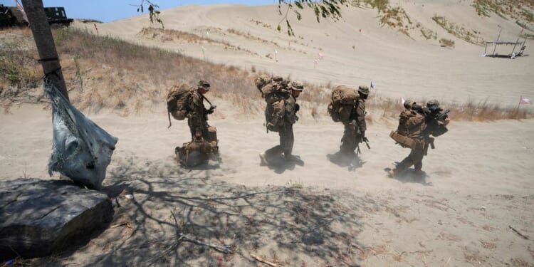 U.S. military plane hits road barrier during Philippine training, injuring 5 U.S. personnel