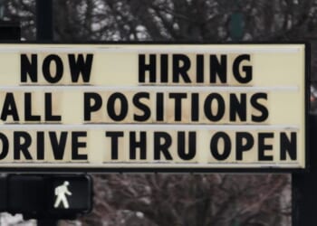 Filings for jobless aid rise modestly to 212,000 as layoffs remain at historically healthy levels