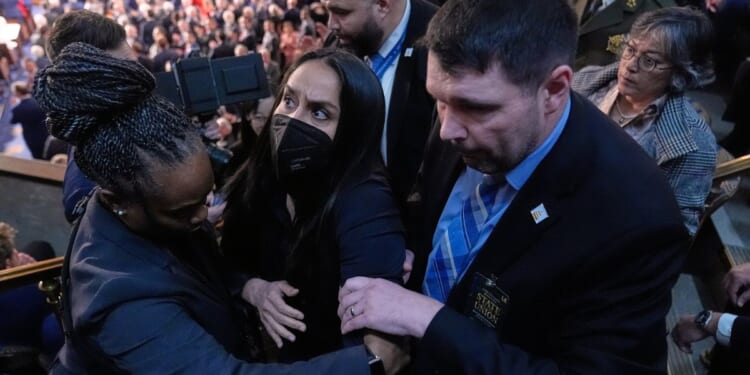 Ilhan Omar's guest arrested at State of the Union after standing during Trump's speech