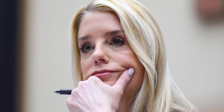 DOJ escalates push for states' voter data