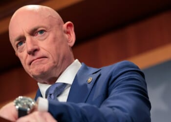 U.S. Sen. Mark Kelly of Arizona speaks at a Feb. 11 news conference.