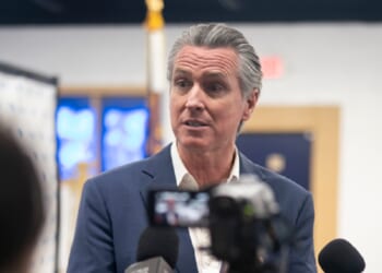 California Gov. Gavin Newsom speaks with reporters Monday during an event hosted by the South Carolina Democratic Party in Manning, South Carolina.