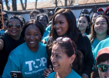 Rep. Jasmine Crockett gathers with supporters at a campaign rally on Feb. 22, 2026, in San Antonio, Texas.