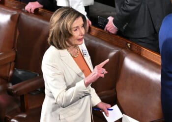 California Representative Nancy Pelosi arrives for President Donald Trump's State of the Union address in the House Chamber of the US Capitol in Washington, DC on Feb. 24, 2026.