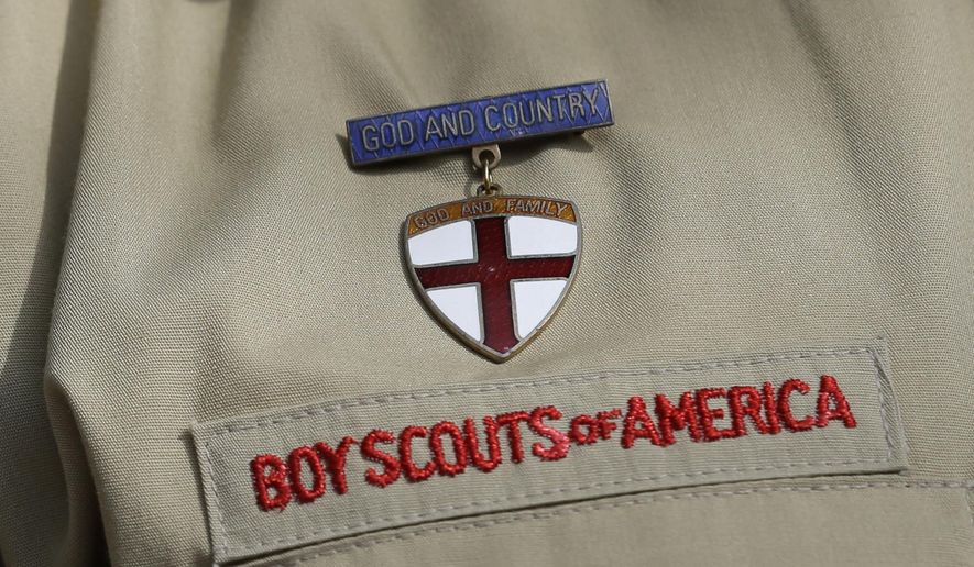 A close-up of a Boy Scout uniform is photographed on Feb. 4, 2013, in Irving, Texas. (AP Photo/Tony Gutierrez, File)