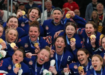 Gold medalist Team United States pose after the medal ceremony for the Ice Hockey Women following the Women's Gold Medal match between the United States and Canada on day 13 of the Milano Cortina 2026 Winter Olympic games at Milano Santagiulia Ice Hockey Arena on Feb. 19, 2026, in Milan, Italy.
