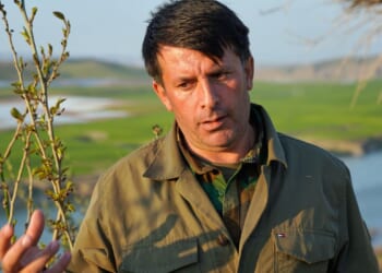 Kurdish Iranian dissidents in Iraq deny attack plans but say they would join a U.S. invasion of Iran