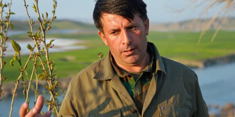 Kurdish Iranian dissidents in Iraq deny attack plans but say they would join a U.S. invasion of Iran