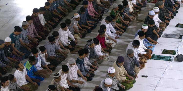 What is sharia, and how do Muslims understand it?