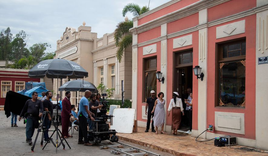 Actors film a scene of the soap opera "A Nobreza do Amor," at a TV Globo set in Rio de Janeiro, Thursday, March 12, 2026. (AP Photo/Bruna Prado)