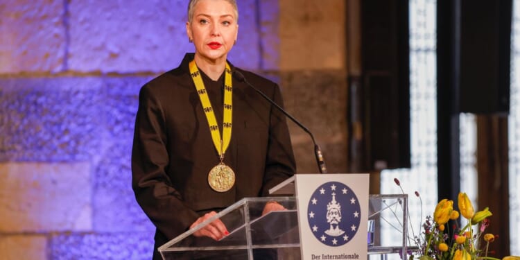 Prominent Belarus opposition figure picks up prize she was awarded while in prison