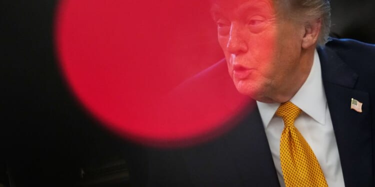 Trump says he is asking to delay trip to China due to war with Iran