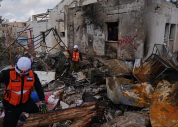 U.S. and Iran trade threats of expanding war after strikes near Israeli areas tied to nuclear sites