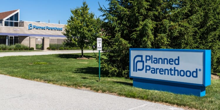 A Planned Parenthood sign sits outside of a facility in Indianapolis, Indiana, on July 4, 2017.