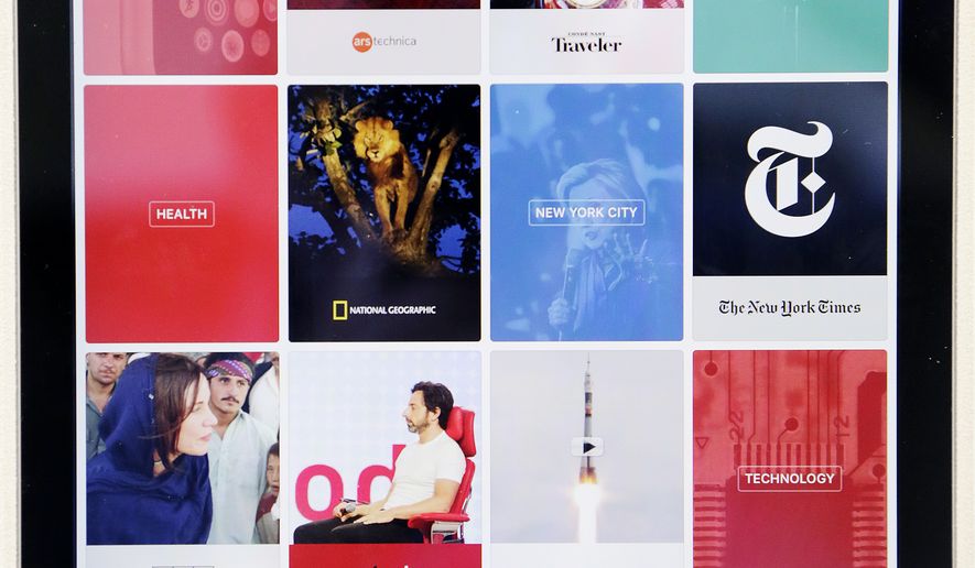 The "favorites" section of Apple's new News app is displayed on an iPad in New York on Wednesday, Sept. 2, 2015. (AP Photo/Mark Lennihan) **FILE**