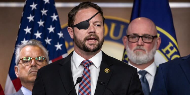 Rep. Dan Crenshaw speaks during a news conference on Capitol Hill on June 26, 2024, in Washington, D.C.