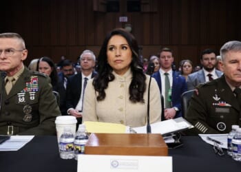 Director of National Intelligence Tulsi Gabbard prepares to testify during a Senate Intelligence Committee hearing on worldwide threats in the Hart Senate Office Building on March 18, 2026, in Washington, D.C.
