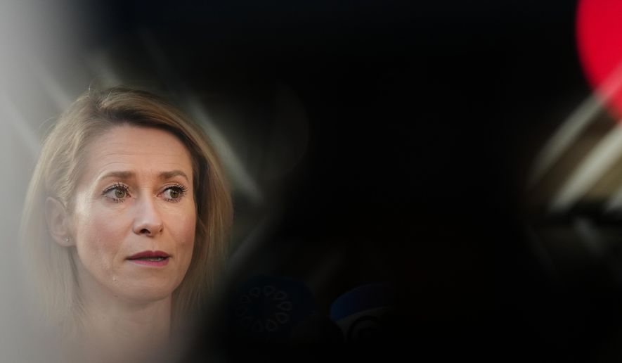 European Union foreign policy chief Kaja Kallas speaks with the media as she arrives for a meeting of EU foreign ministers at the European Council building in Brussels, Monday, March 16, 2026. (AP Photo/Virginia Mayo)