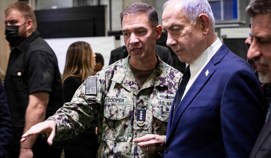 Adm. Brad Cooper, commander of U.S. Central Command, and members of the Israeli Defense Forces host Israeli Prime Minister Benjamin Netanyahu inside the Civil-Military Coordination Center (CMCC) Oct. 29, 2025, in Israel. (Staff Sgt. Michael Ito/U.S. Army via AP)