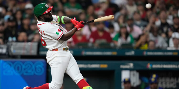 Mexico's Randy Arozarena doubles during the first inning of a World Baseball Classic game against Brazil on March 8, 2026, in Houston, Texas.