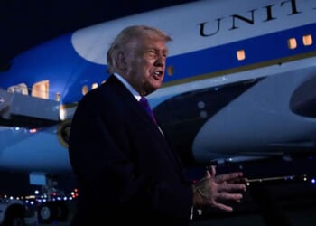President Donald Trump speaks to the news media Wednesday in front of Air Force One at Joint Base Andrews, Maryland.