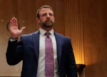 U.S. Sen. Markwayne Mullin (R-OK) is sworn in before testifying in the Dirksen Senate Office Building on March 18, 2026 in Washington, DC.