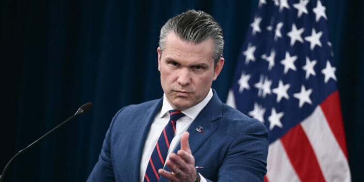 Secretary of War Pete Hegseth speaks during a news conference on U.S. military action in Iran, at the Pentagon in Washington, D.C., on March 2, 2026.