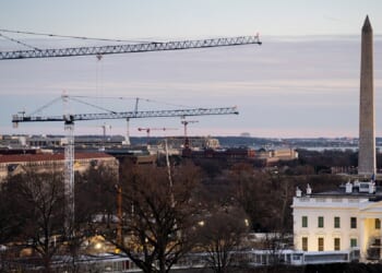 Cranes mark the D.C. skyline as part of construction on the new ballroom extension of the White House in January.