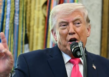 President Donald Trump speaks during a ceremony in the Oval Office of the White House in Washington, DC on March 24, 2026.