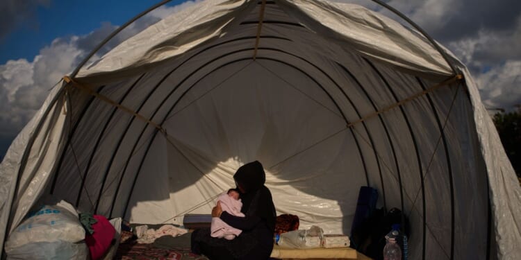 A baby born in a tent on a Beirut roadside struggles to survive, her family displaced by war