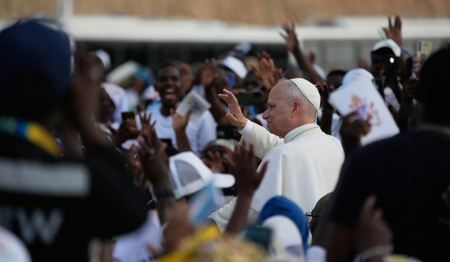 Pope Leo XIV arrives at the esplanade in front of the Sanctuary of Mama Muxima, in Muxima, Angola, Sunday, April 19, 2026. (AP Photo/Themba Hadebe)