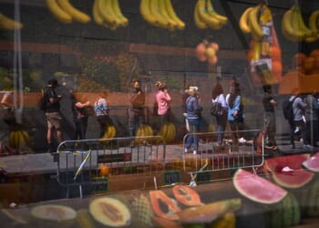 Migrants rush to apply under Spain’s new mass legalization program