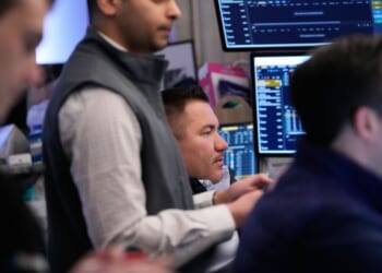 Oil prices rise, but U.S. stocks remain near their record on a muted Wall Street