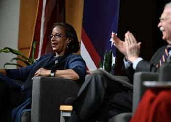 John Bolton and Susan Rice seated